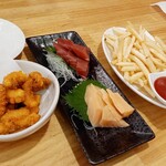築地市場食堂 松本駅前店 - タコ唐揚げ.ポテト.刺身