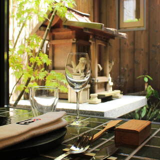 A spacious Kyoto-style interior with a view of the small garden