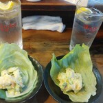 もつ焼 まるい - お通し（ポテトサラダ）