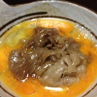 牛幸 本店 - 卵の中でとろけるお肉、最高です。