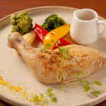 Grilled tender bone-in chicken cooked at low temperature with Japanese-style truffle sauce