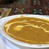 サプナ - ＊この日のカレーは「キーマエッグカレー」、辛さは中辛で。 挽肉も結構入っていますけれど、生卵とゆで卵が入っているのが面白い。カレーは普通に美味しいとの感想。