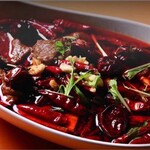 Authentic Sichuan beef short ribs and vegetables stew with spicy aroma