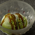 Rich matcha ice cream topped with brown sugar syrup