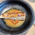 La Brianza - マナガツオ半生炭火焼きアメーラトマトアサリ出汁。ふっくらマナガツオさっぱりトマト味のソース、アサリ出汁の旨みもいいですね