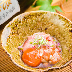 Bluefin tuna and pickled egg yolk dressed with sake