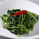 Stir-fried seasonal green vegetables