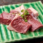 Thickly sliced salt-grilled freshly caught beef heart