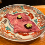 肉料理かなえ - タンのお刺身　大徳寺納豆の昆布ソース　山葵