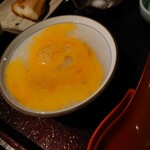 栃尾又温泉　自在館 - お粥に卵とちょっとお醤油。写真では、美味しそうに見えませんね　　＾＾；