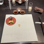 カツレツMATUMURA - 茄子と茗荷のお漬物と、ズッキーニのお漬物。ソースは左から自家製ポン酢、イギリス産マルドン塩、自家製ウスターソース、右の白い液体は千切りキャベツ用のドレッシング