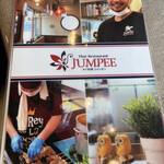 タイ料理ジャンピー - メニュー表紙の右上に店主