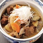 Beef tendon stew slowly simmered in a large pot