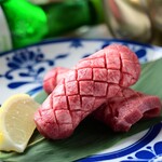 Thickly sliced raw tongue (1 slice)