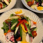 Seasonal vegetables and bacon salad