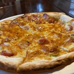 Spicy sausage and onion pizza