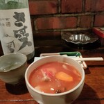 Sasuraibito - お通し：根菜のトマトスープ