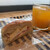 白楽ベーグル - 料理写真:サンドイッチ（ロースハム＆カマンベール）　¥300
          みかんしぼり　¥370