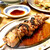 串屋横丁 - 料理写真:赤モツ焼き　デカくて旨い