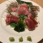 Three pieces of bluefin tuna sashimi