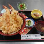 Bowl of rice and fried fish