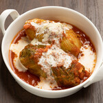 Cabbage rolls with rich cheese sauce