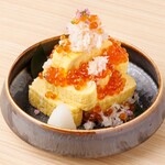 Dashi-wrapped egg with snow crab and salmon roe