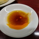 新シン - 辣油、酢、醤油とおろしニンニクを少々