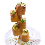 Tower of Garlic Toast with Truffle White Sauce