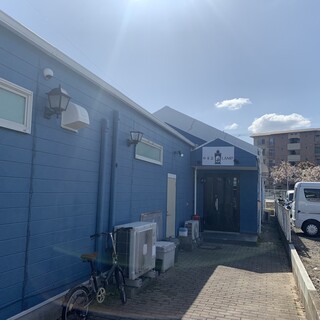 There's a parking lot. There is a gravel parking lot next door, right in front of you when you enter.