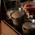 Warm sake made with tin dust