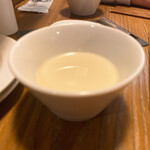 Genka bisutoro ban - お通し：牛骨出汁と豆乳のスープ