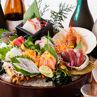 Our proud fresh sashimi. Served from a fish tank filled with live fish!