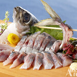 Live horse mackerel sashimi