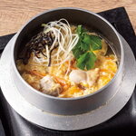 Chicken rice porridge eaten in a pot