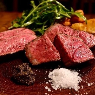 Enjoy Hokkaido Tokachi herb beef grilled over wood.