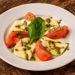 Roasted caprese with fresh tomatoes and mozzarella