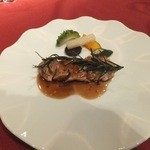 グランマーレ - メインディッシュ。ヤンバル鶏モモ肉のロースト　トリュフの香るイタリアンソース。