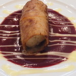 ポテトに包まれたスズキのポワレ