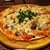 AlcolicCafeロジェ - 料理写真:スモークサーモンとキノコのトマトピザです