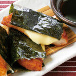 Melty cheese and potato mochi wrapped in seaweed