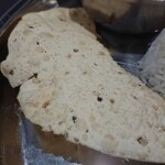 MOMO STATION - Papad with Saag underneath