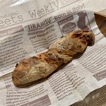 パンやきどころ RIKI - パンチェッタとセミドライトマトチェダーチーズのスティック ¥300