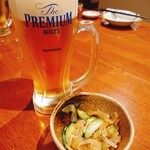 Saheiji - 生ビールとお通し (クラゲの酢の物)