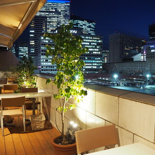 We recommend the open terrace seating where you can see different faces during the day and at night.