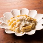 Penne with freshly shaved aged cheese