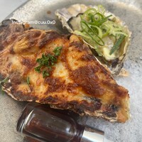 梅田 ワーフ - 牡蠣の殻付きグラタン