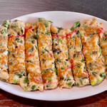 お好み焼き 鉄ちゃん - 少し厚めにした生地に青葱と紅生姜がたっぷり入った葱焼き