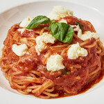 Tomato pasta with mozzarella and basil