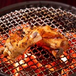 Charcoal grilled pork feet